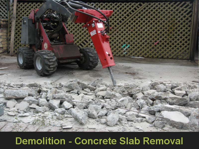 Dingo Mini Digger in action - Demolition of a Concrete Slab